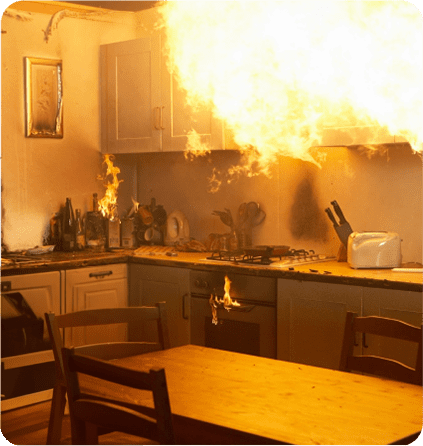 A kitchen with flames coming from the oven.